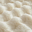 White faux fur throw blanket by CozyNest Decor, plush and cozy, thick and warm queen-sized bed blanket for comfort and style.