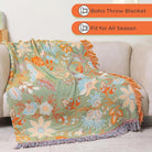 CozyNest Decor boho fall throw blanket, 90x98 inches, orange and sage green floral print, soft breathable cotton for bed or sofa.