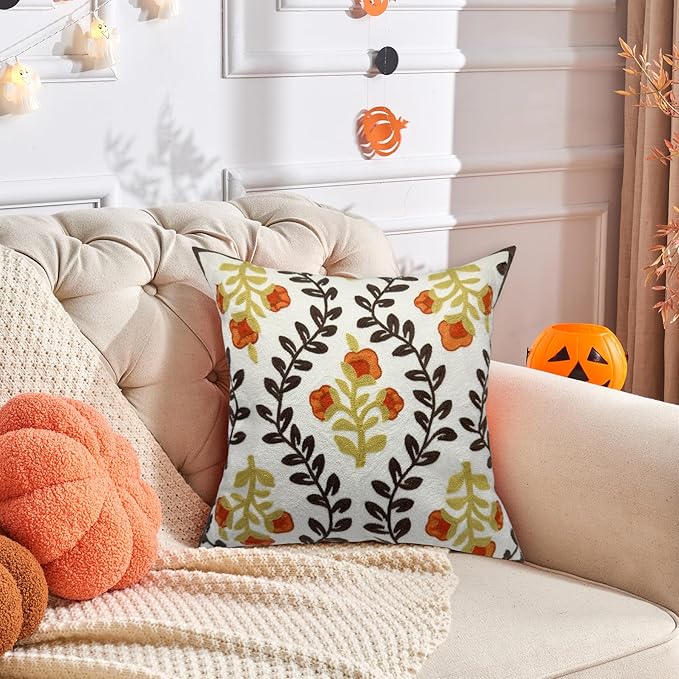 CozyNest Decor Alysheer floral embroidered fall throw pillow cover, 18x18 inches, orange flowers and brown leaves on cotton canvas.