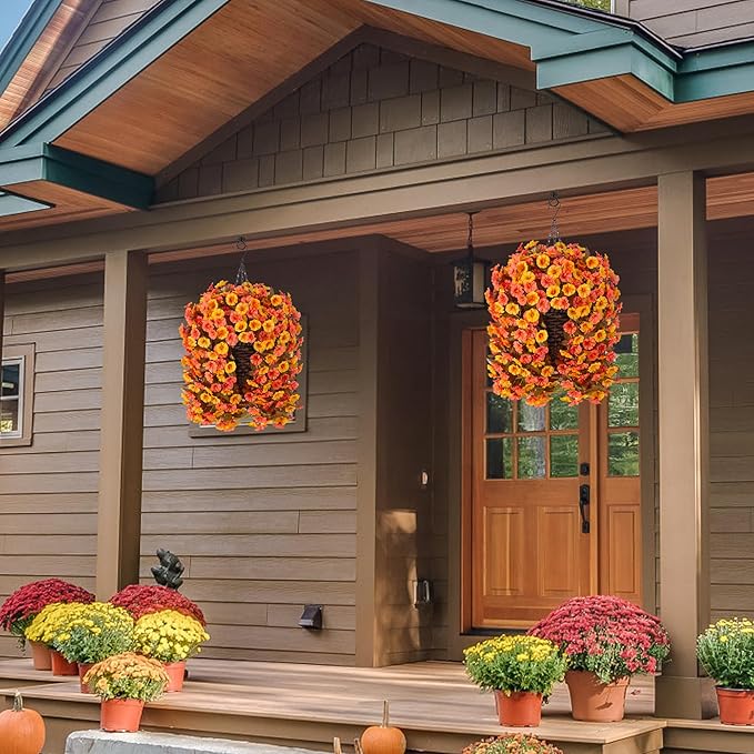 Artificial fall flowers from CozyNest Decor with orange and yellow silk morning glory vines in a hanging basket for outdoor autumn decor.