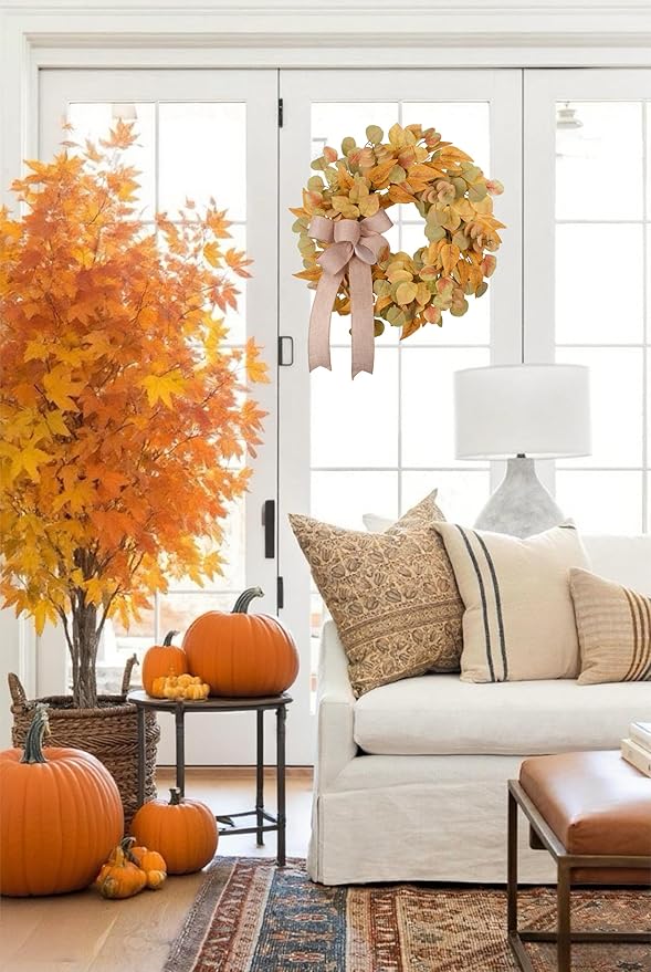 Fall wreath for front door featuring autumn-colored faux leaves and a bow, ideal for farmhouse decor indoors or outdoors.