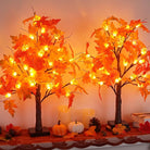 CozyNest Decor 2-pack 24-inch prelit fall maple trees with 48 LEDs, battery-operated, ideal for Thanksgiving and autumn home decor.