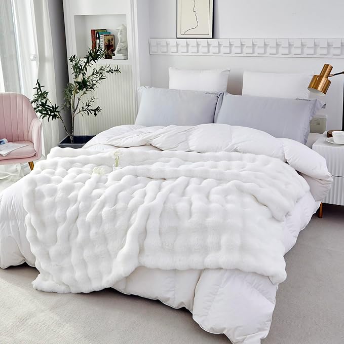 CozyNest Decor ivory faux fur throw blanket with plush, fluffy double-sided rabbit fur texture, perfect for couch, sofa, or bed.
