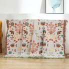 CozyNest Decor boho cotton throw blanket with floral and animal prints, large rustic quilt for bed, sofa, or chair, 90x98 inches.