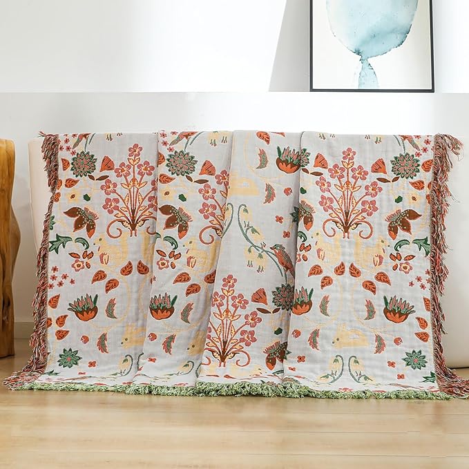 CozyNest Decor boho cotton throw blanket with floral and animal prints, large rustic quilt for bed, sofa, or chair, 90x98 inches.