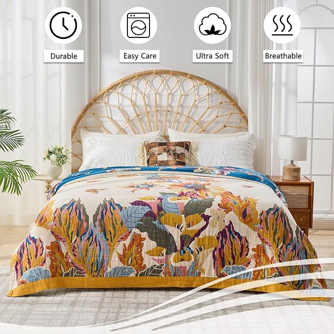 Colorful boho throw blanket for bed featuring floral and bird patterns, lightweight reversible cotton quilt in queen size.