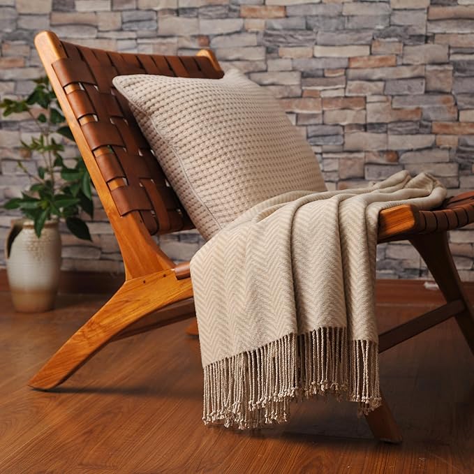 CozyNest Decor silk throw blanket with hand-knotted fringe in taupe, soft, breathable herringbone pattern for cozy comfort.