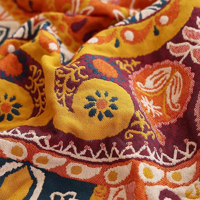 CozyNest Decor boho-style twin size muslin blanket with floral design, 4-layer gauze cotton, soft and cooling for sofa or bed.