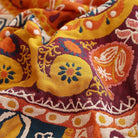 Boho orange muslin adult blanket with geometric floral pattern, 80x90 inches, soft 100% cotton, cozy summer bed coverlet.