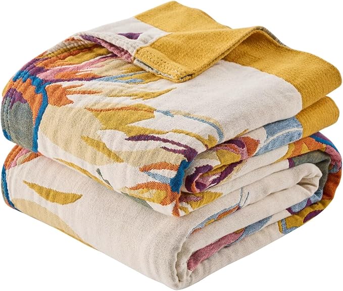 CozyNest Decor boho throw blanket with floral southwestern print, lightweight cotton, reversible design, 50x60 inches for bed or sofa.