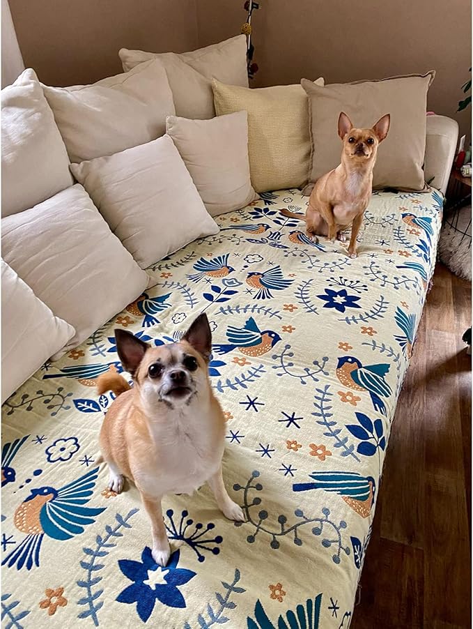 CozyNest Decor fall throw blanket with bird and flower patterns, versatile organic cotton blanket for beds, couches, and vintage décor.