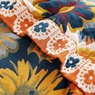Soft boho muslin blanket for adults by CozyNest Decor, 80x90 inches with daisy floral design, perfect for sofa or bed coverlet.