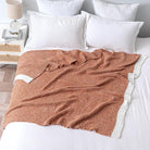 CozyNest Decor MIULEE burnt orange throw blanket for bed or sofa, soft, fluffy, 60x80 inches, ideal for cozy living spaces.