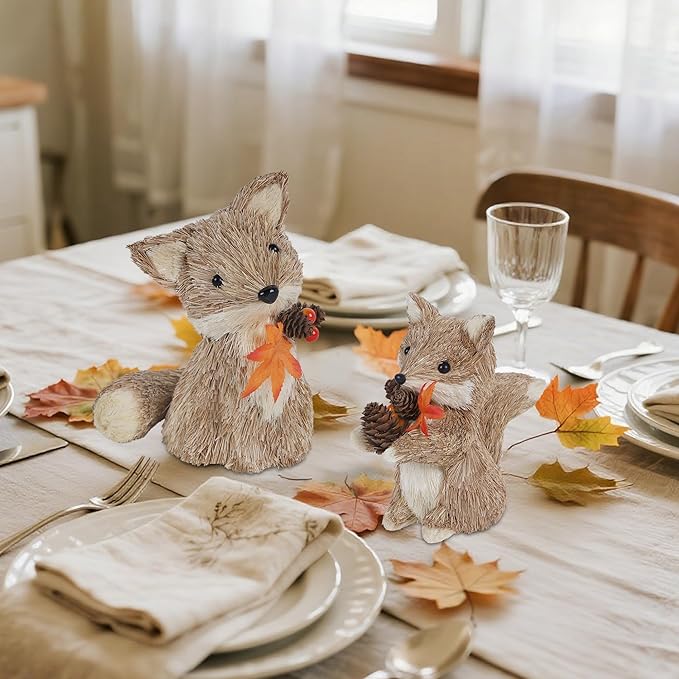 Set of two CozyNest Decor fall-themed fox figurines, handmade autumn centerpiece ornaments for home mantel or fireplace decor.