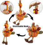CozyNest Decor plush turkey figurine with stretchable head, sitting design, perfect for fall indoor tabletop Thanksgiving decoration.