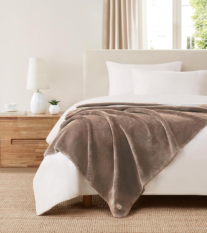 CozyNest Decor white plush fleece throw blanket, lightweight and soft, ideal for couch or bed, in light fawn brown, 50x70 inches.