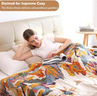 CozyNest Decor boho large throw blanket with fall floral and bird design, 100% organic cotton, breathable and soft for sofa or bed.