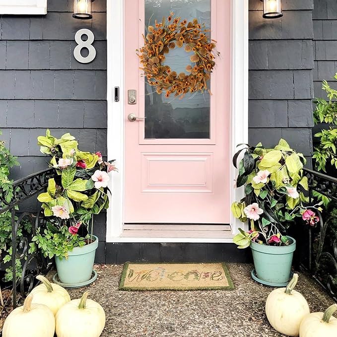 Artificial 22-inch fall wreath by CozyNest Decor featuring eucalyptus leaves, wildflowers, and harvest accents for seasonal home decor.