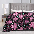 Pink fleece throw blanket from CozyNest Decor, soft and cozy for kids and adults, perfect for couch, bed, or party decor.