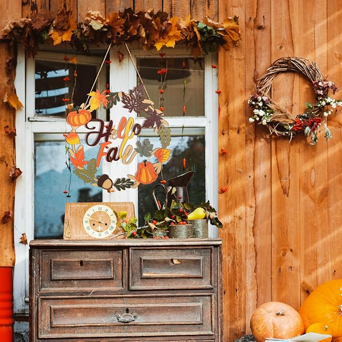 CozyNest Decor fall wreath with hello fall and autumn-themed maple leaf, pumpkin, and wooden welcome sign for front door decoration