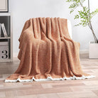 CozyNest Decor MIULEE burnt orange throw blanket, twin size, soft, fluffy knit blanket for bed, couch, or outdoor use.