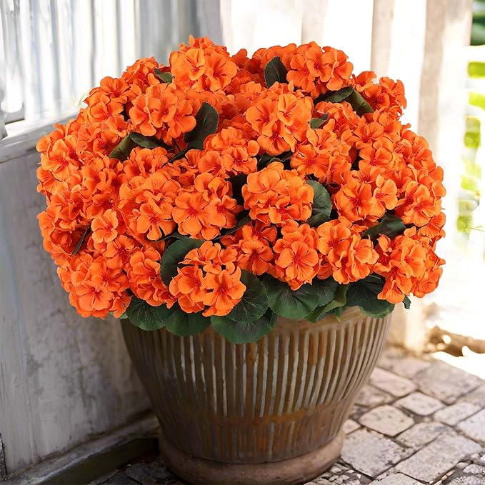 CozyNest Decor 12-pack artificial orange geranium flowers for outdoor and indoor use, UV resistant faux fall flowers for decor.