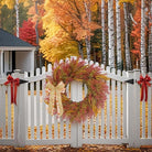 Large 24-inch cedar fall wreath with burlap bow by CozyNest Decor, weatherproof outdoor porch decor for autumn and holiday celebrations.