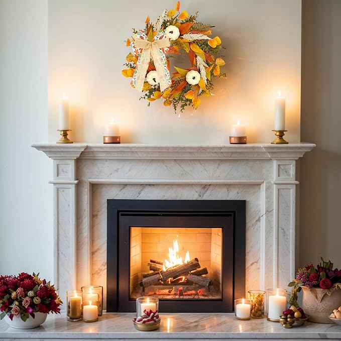 Rustic fall wreath by CozyNest Decor with golden eucalyptus, white pumpkins, wheat, and a bow, perfect for front door decor.