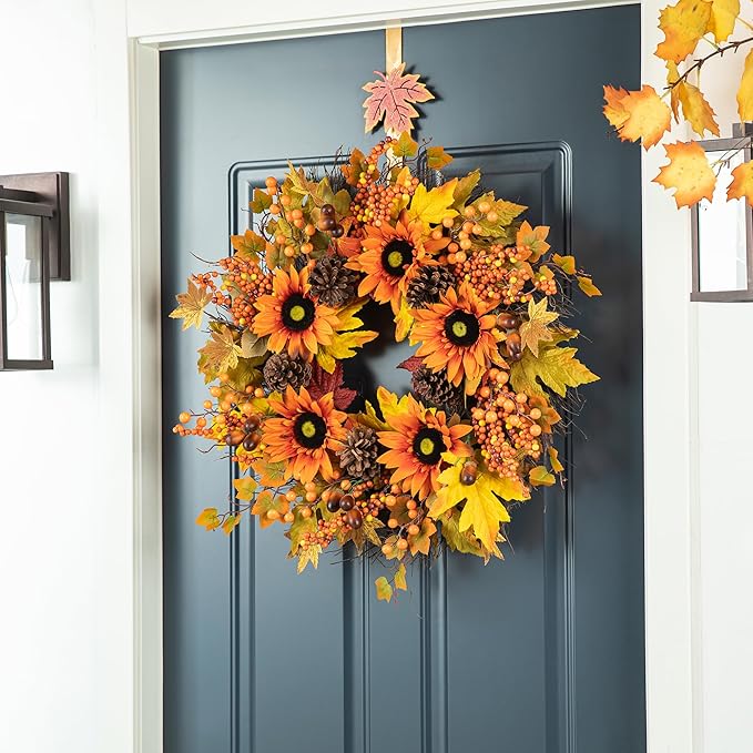 Artificial fall wreath by CozyNest Decor featuring orange sunflowers, maple leaves, berries for front door or wall decor.