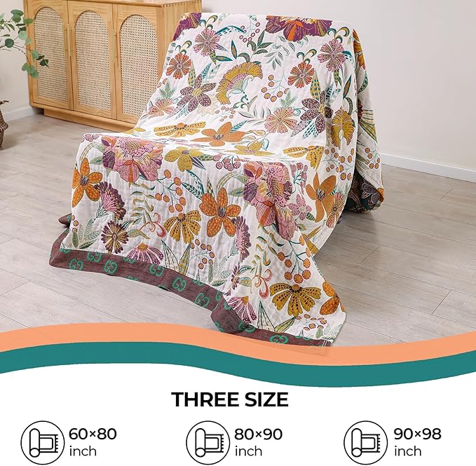 CozyNest Decor boho rustic cotton throw blanket with floral design, reversible, 60x80 inches, perfect for sofa or bed decor.