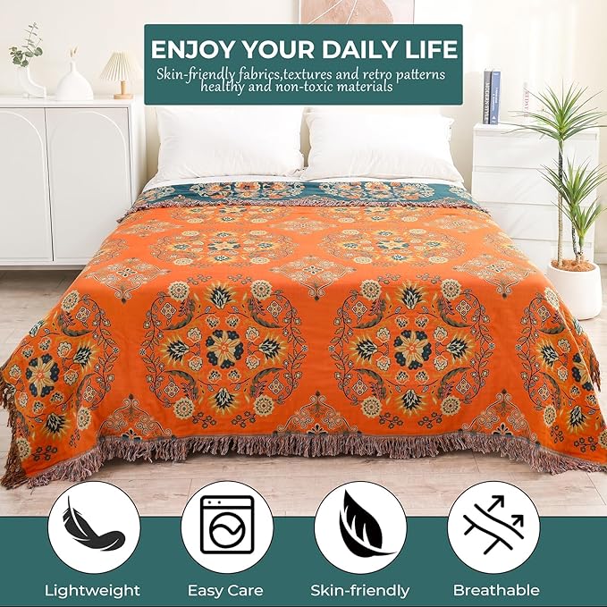 CozyNest Decor orange floral printed fall throw blanket on a bed, lightweight 100% cotton farmhouse quilt, 60x80 inches.