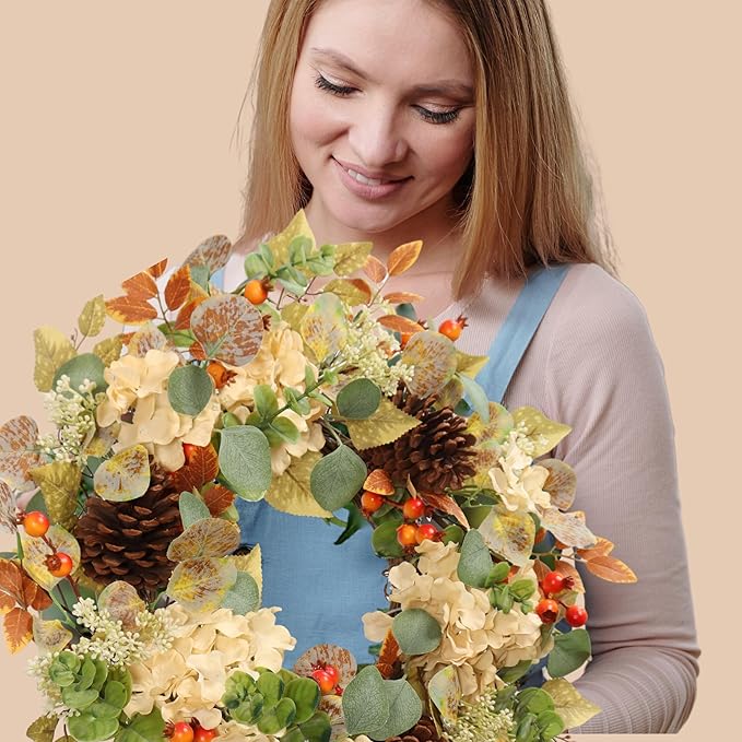 Fall hydrangea and eucalyptus wreath with pinecones and orange berries, perfect for autumn door decor, indoor or outdoor use.