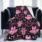 Pink CozyNest Decor fleece throw blanket for kids and adults, soft and cozy for couch, bed, or sofa decor.