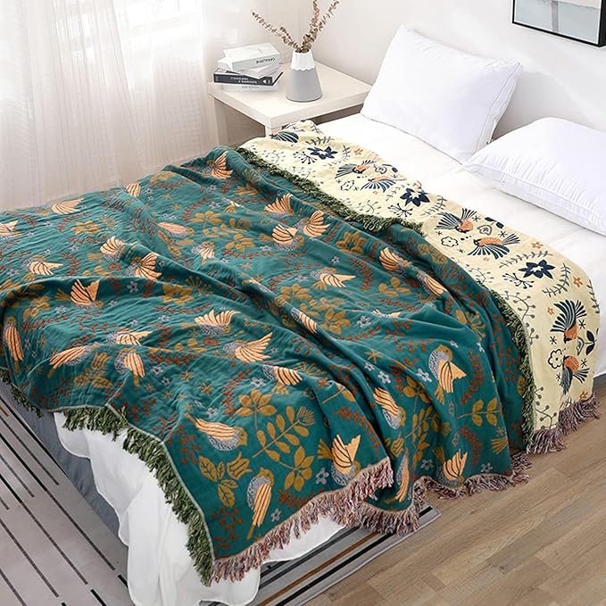 CozyNest Decor fall throw blanket with bird and flower patterns, versatile organic cotton blanket for beds, couches, and vintage décor.