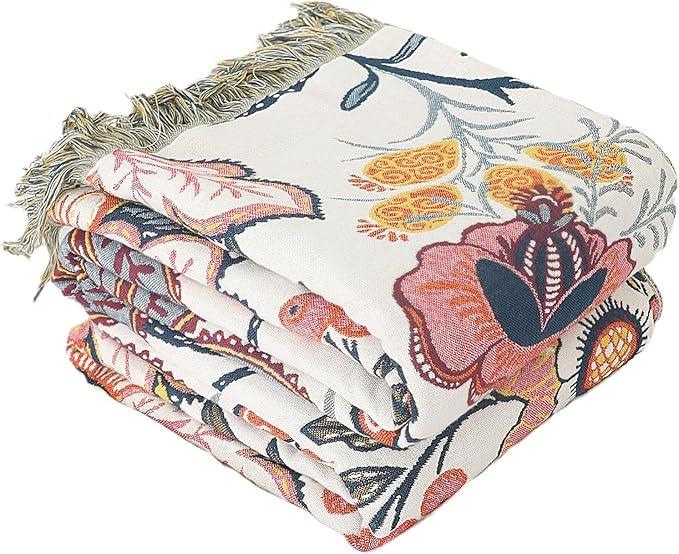 CozyNest Decor boho throw blanket in white, 100% organic cotton muslin with floral farmhouse design for bed or sofa decor.