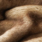 CozyNest Decor BATTILO HOME luxury ochre faux fur throw blanket on a sofa, plush warm mink fur for home decor and comfort.
