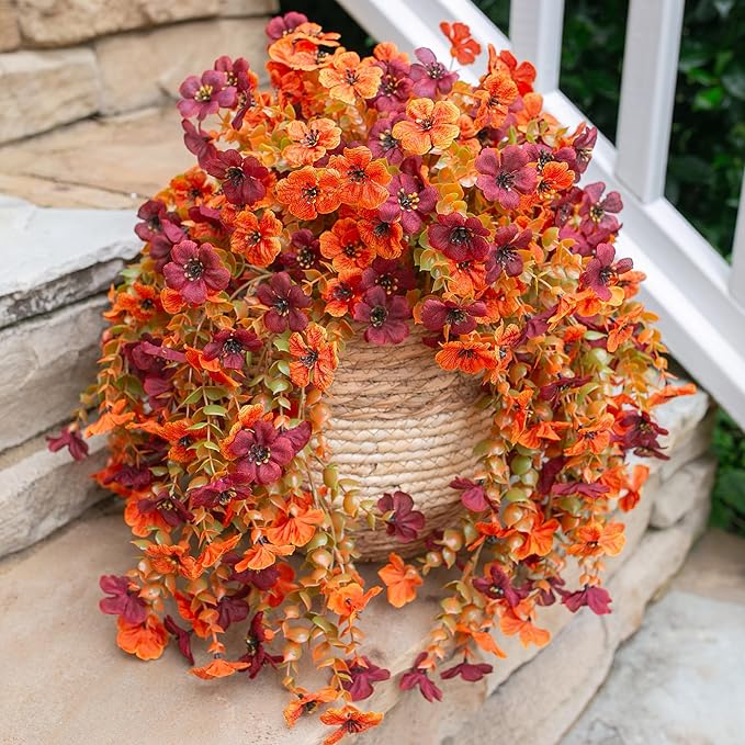 CozyNest Decor artificial autumn flowers, 2-pack light orange and brown silk daisies for outdoor porch, balcony, or patio decor.