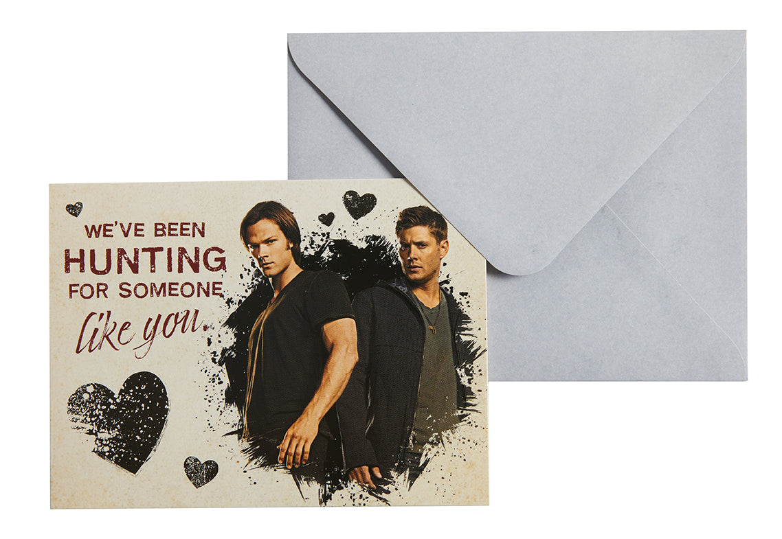 Inside view of Supernatural Valentine's Day hardcover note cards by Insight Editions, featuring themed illustrations and blank pages.