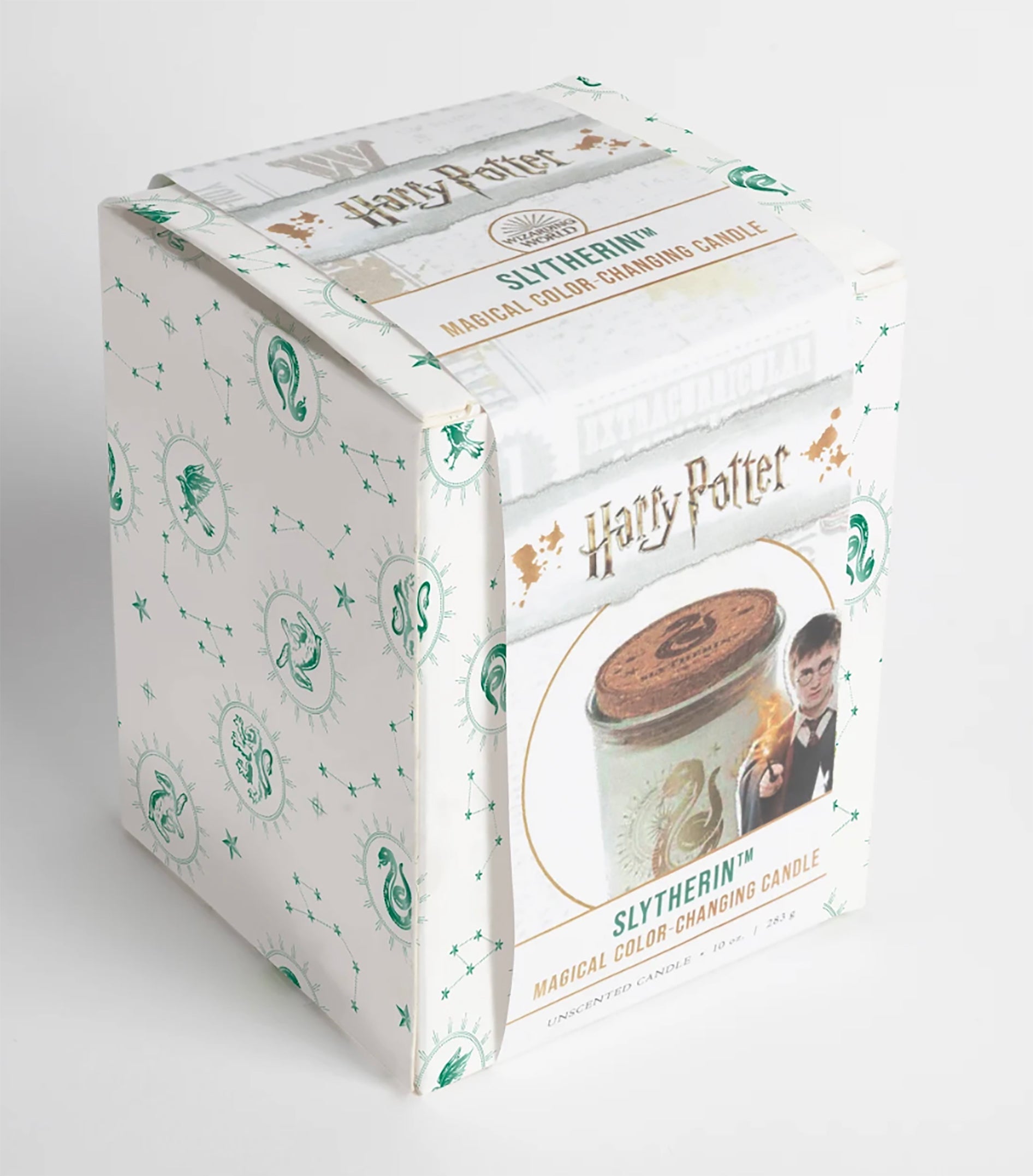 Color-changing Slytherin Harry Potter candle from Insight Editions, featuring a green serpent design and magical interior glow.