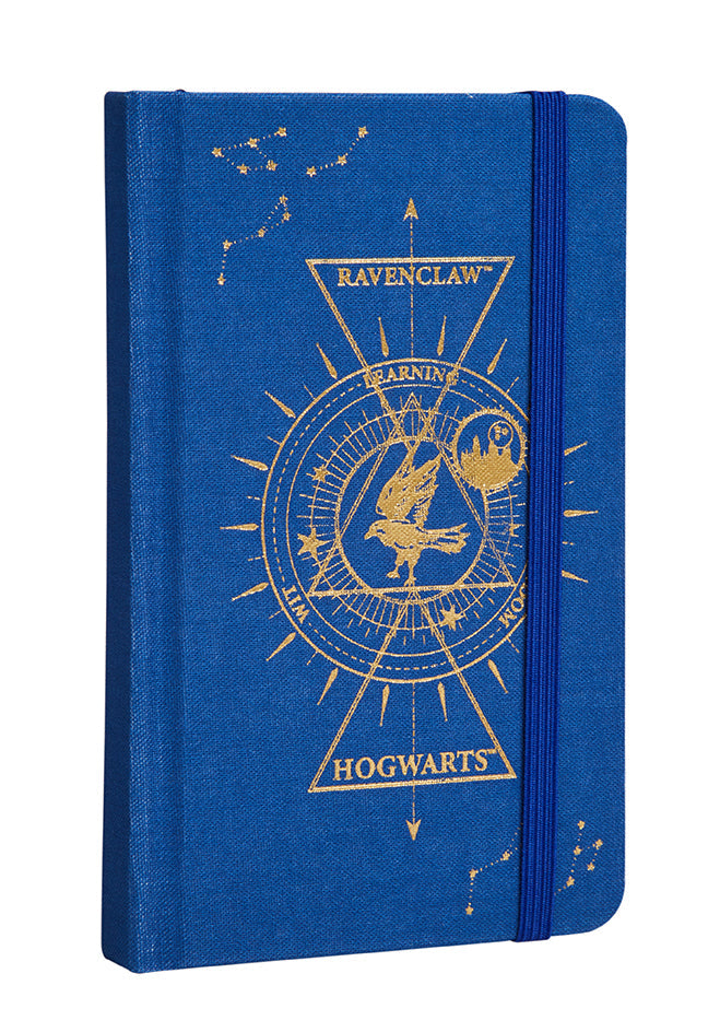 Inside view of the Harry Potter Ravenclaw Constellation hardcover pocket journal by Insight Editions, showing ruled pages and celestial design.