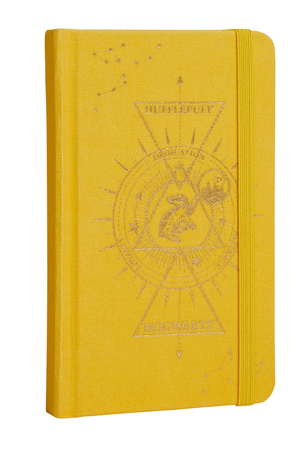 Hufflepuff constellation hardcover pocket journal by Insight Editions with pages open showing starry Hufflepuff design.