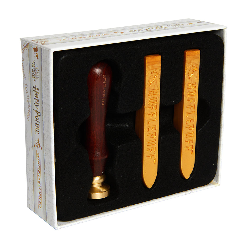 Harry Potter Hufflepuff wax seal set kit with Hufflepuff crest and sealing wax, perfect for themed correspondence and crafts.