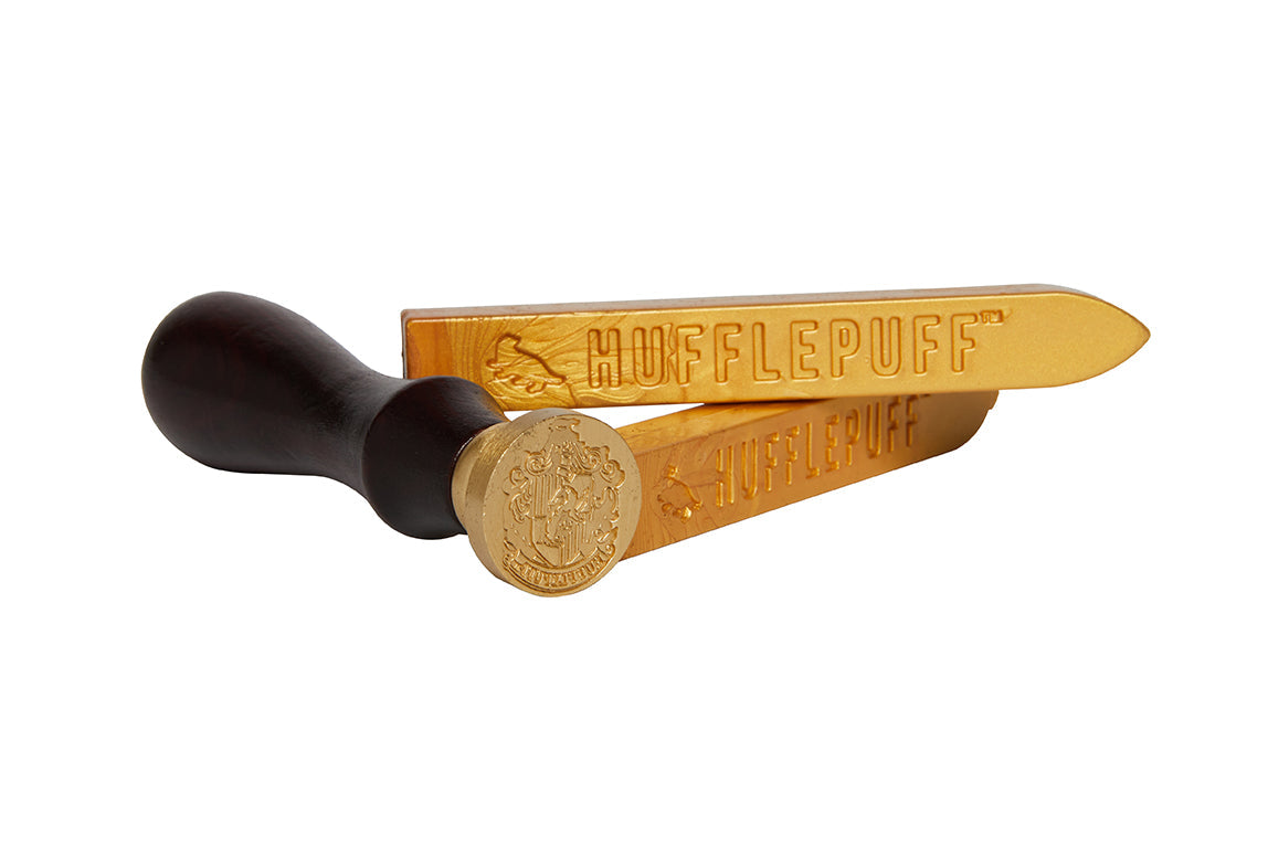 Harry Potter Hufflepuff wax seal set kit with Hufflepuff crest stamp, wax sticks, and sealing accessories for magical themed crafts.
