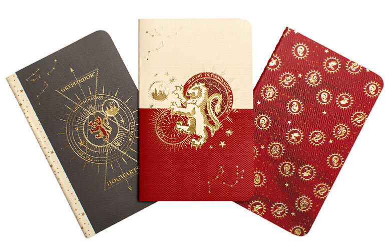 Set of three Harry Potter Gryffindor constellation sewn pocket notebooks with softcover covers featuring magical designs.