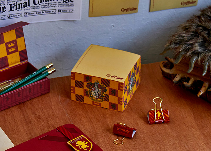 Gryffindor Harry Potter memo cube from Insight Editions' Classic Collection with house crest and decorative Harry Potter-themed design.