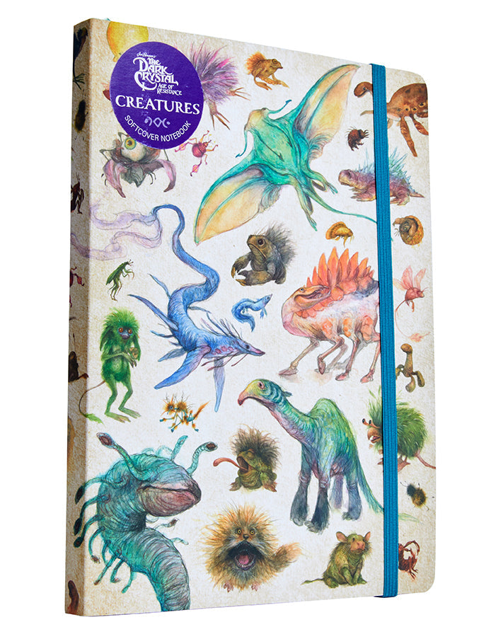 Softcover notebook featuring The Dark Crystal Bestiary Creatures cover with mystical artwork and detailed creature illustrations.