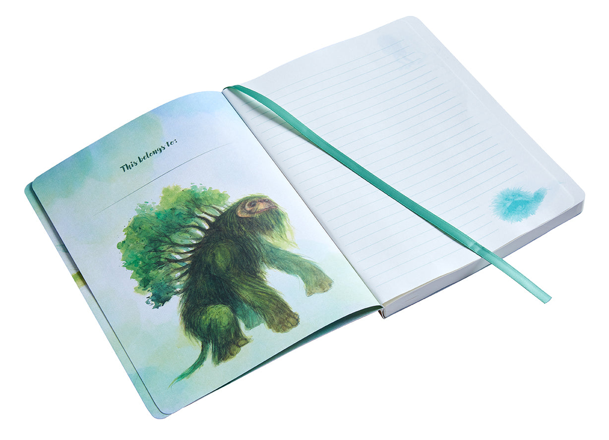 Inside view of The Dark Crystal Bestiary Creatures softcover notebook by Insight Editions, featuring illustrated pages and creature sketches.