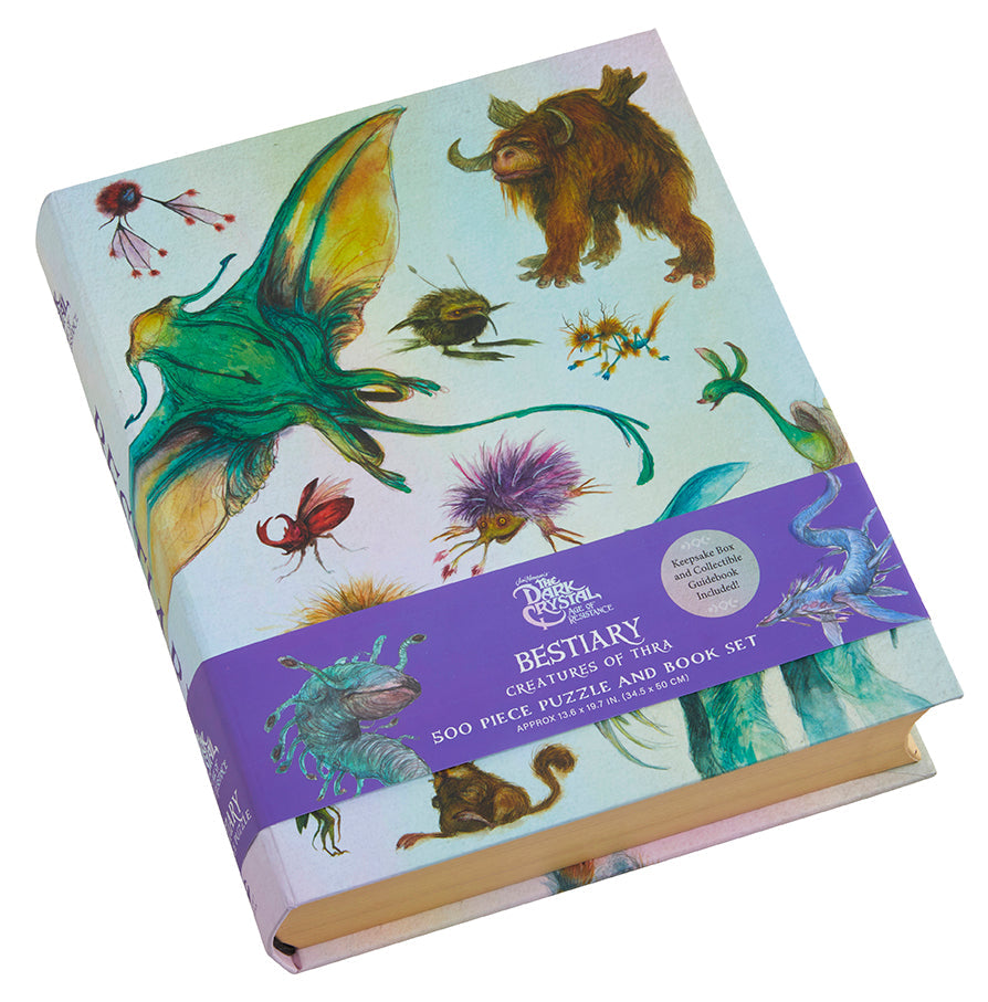 Cover image of Jim Henson's The Dark Crystal Bestiary puzzle and book set by Insight Editions featuring fantasy artwork.