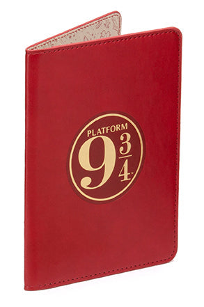 Insight Editions Harry Potter Platform 9-3/4 travel kit with wizard-themed accessories and packaging inside.