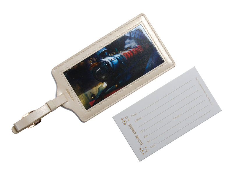 Insight Editions Harry Potter Platform 9-3/4 travel kit with luggage tags and accessories, shown with inside compartments and design details.